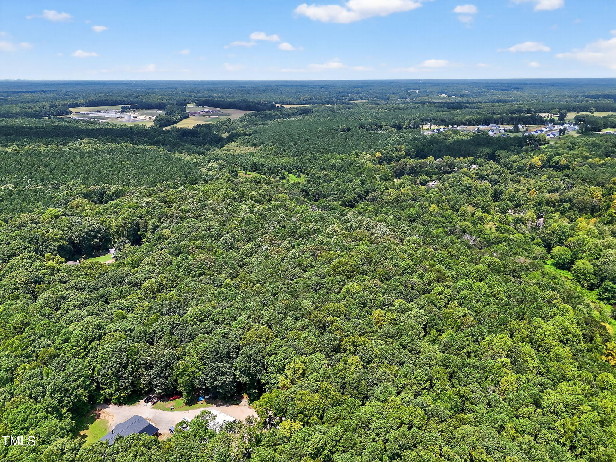 0 Eatmon Road Zebulon, NC 27597 - Photo 11 of 13 a view of a lush green field