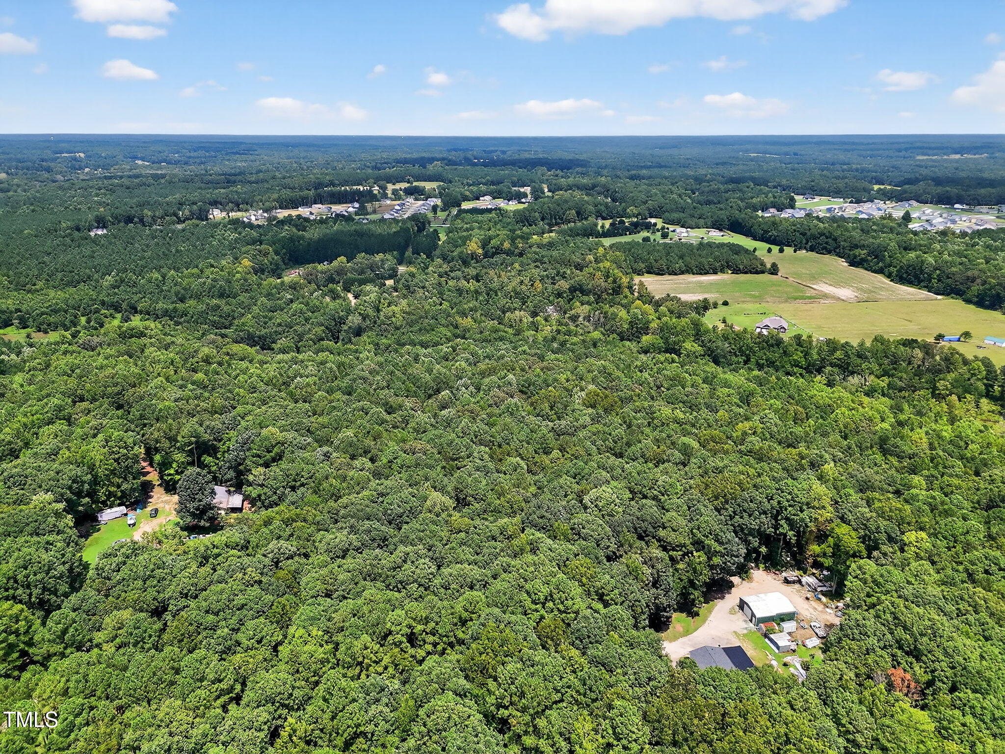 0 Eatmon Road Zebulon, NC 27597 - Photo 10 of 13 an aerial view of a house with a yard lake view and mountain view