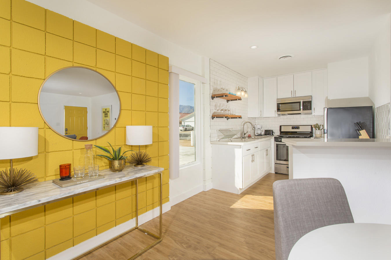 68080 Risueno Road Cathedral City, CA 92234 - Photo 16 of 98 a kitchen with stainless steel appliances a stove a sink and a refrigerator