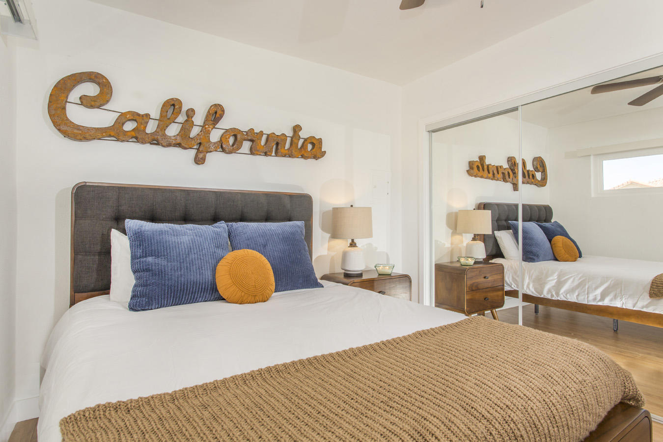 68080 Risueno Road Cathedral City, CA 92234 - Photo 22 of 98 a bedroom with two bed and a window