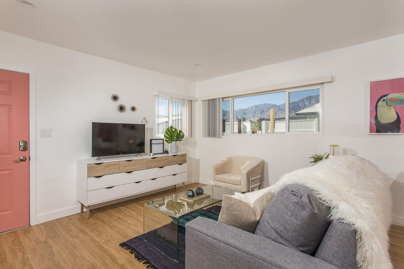 68080 Risueno Road Cathedral City, CA 92234 - Photo 34 of 98 a living room with furniture and a flat screen tv
