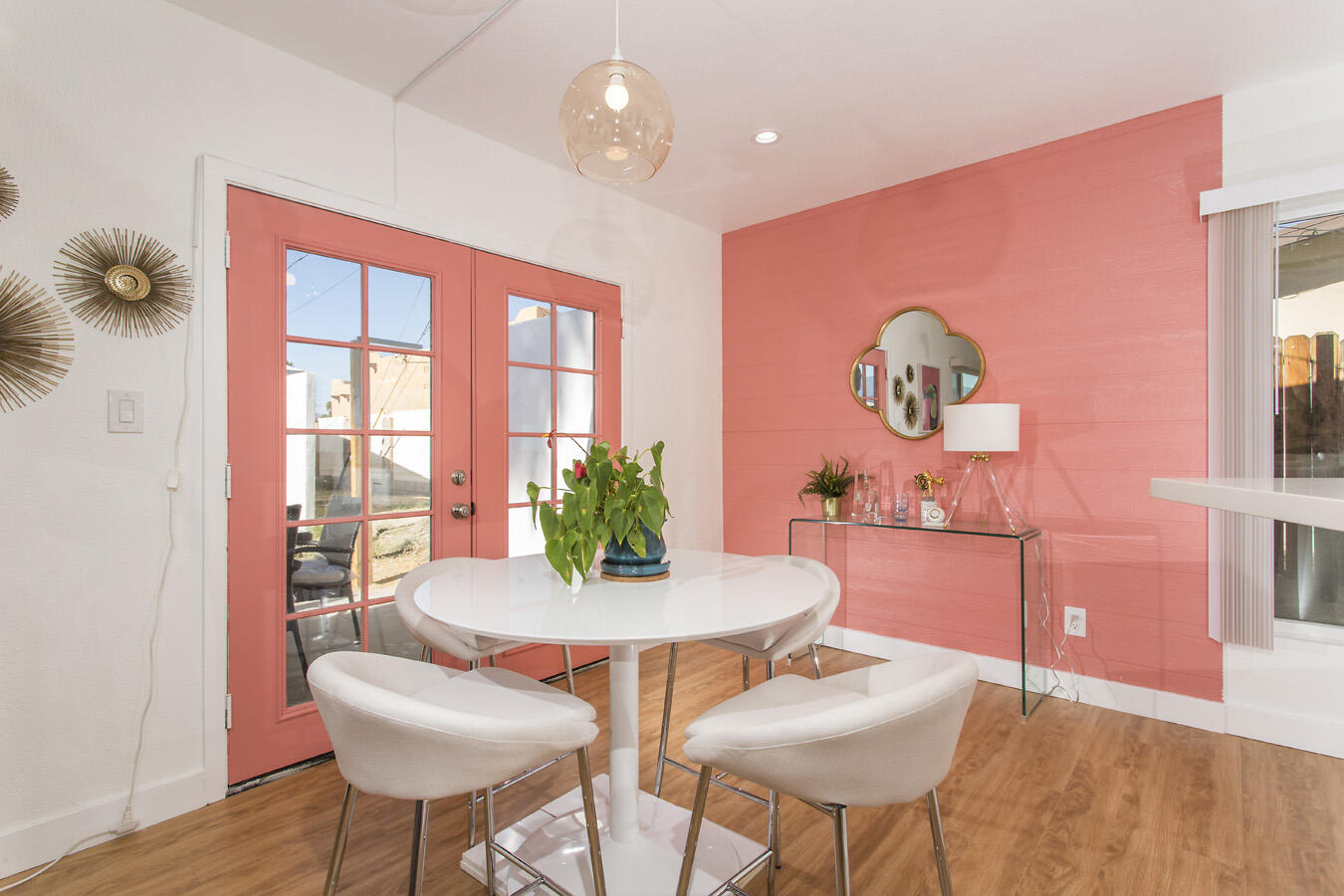 68080 Risueno Road Cathedral City, CA 92234 - Photo 38 of 98 a view of a dining room with furniture and wooden floor