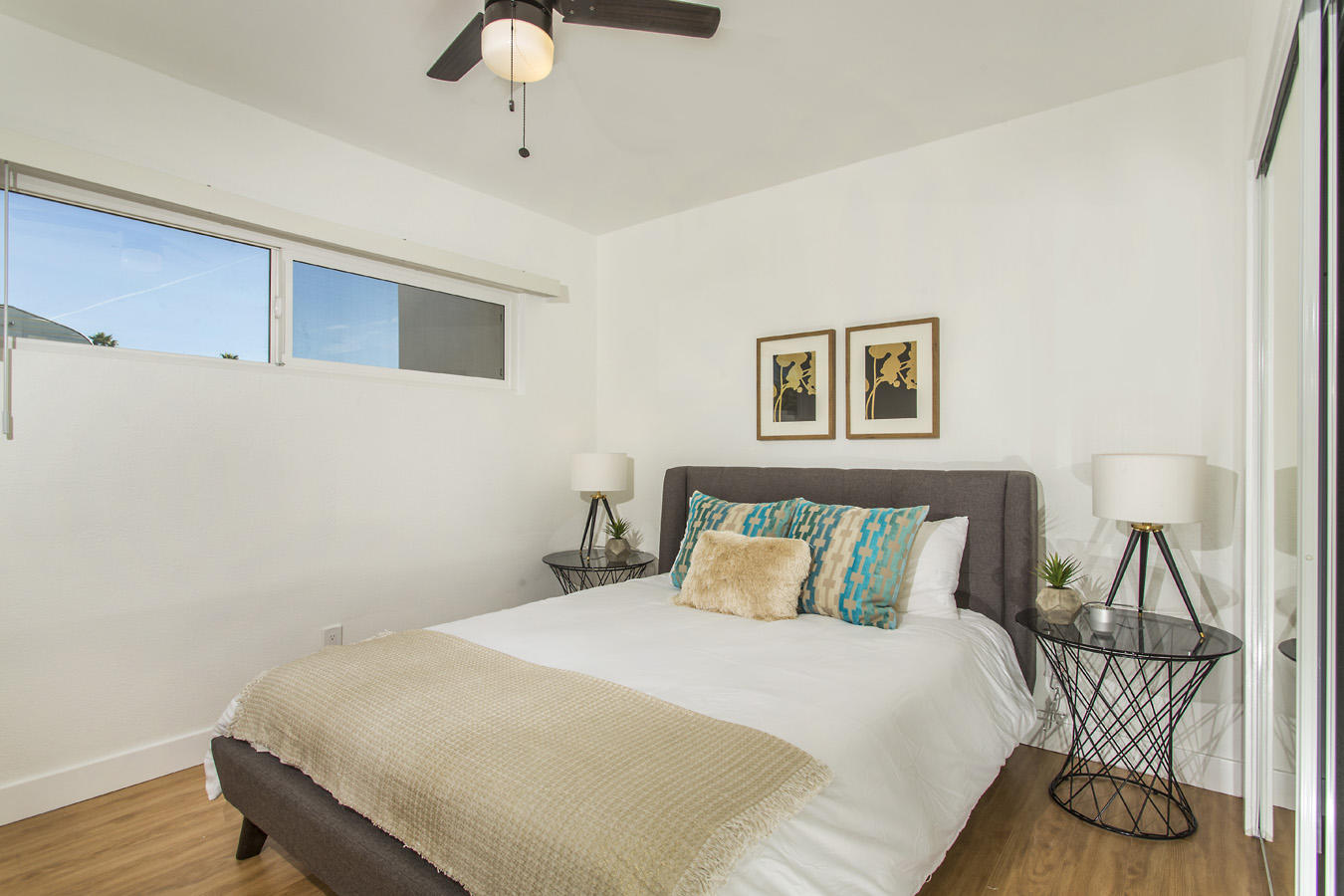 68080 Risueno Road Cathedral City, CA 92234 - Photo 49 of 98 a bedroom with a bed and wooden floor