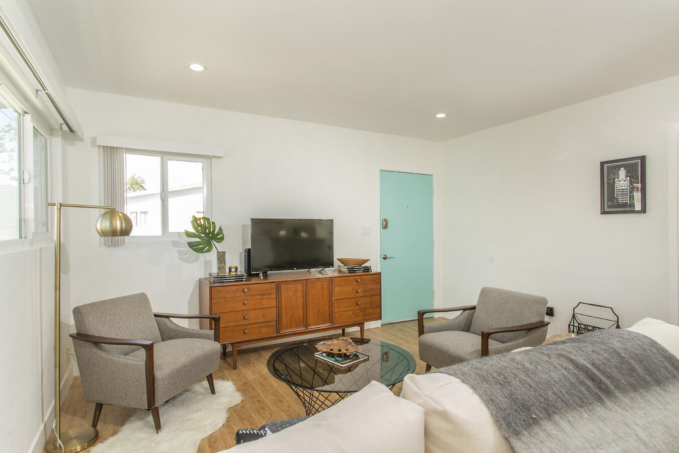 68080 Risueno Road Cathedral City, CA 92234 - Photo 60 of 98 a living room with furniture and a flat screen tv