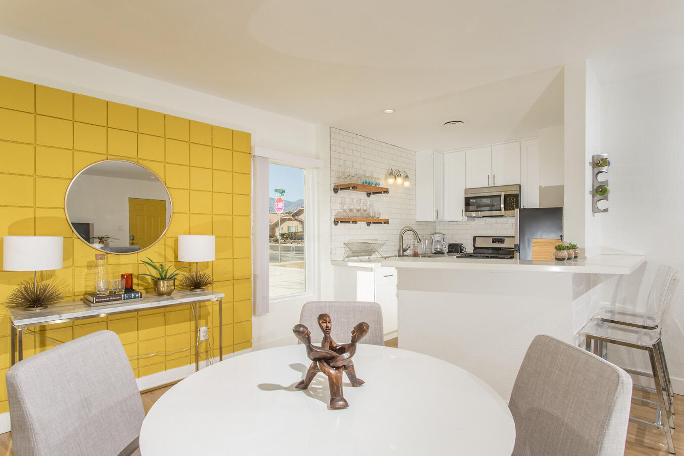 68080 Risueno Road Cathedral City, CA 92234 - Photo 8 of 98 a kitchen with stainless steel appliances kitchen island granite countertop a sink and a refrigerator