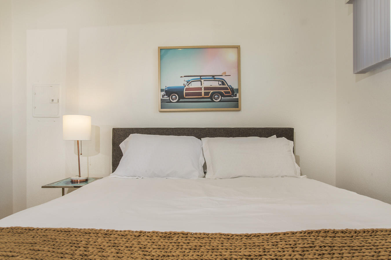 68080 Risueno Road Cathedral City, CA 92234 - Photo 78 of 98 a bedroom with a bed and a lamp on table