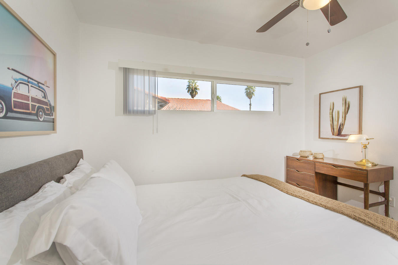 68080 Risueno Road Cathedral City, CA 92234 - Photo 80 of 98 a bedroom with a bed and a chandelier