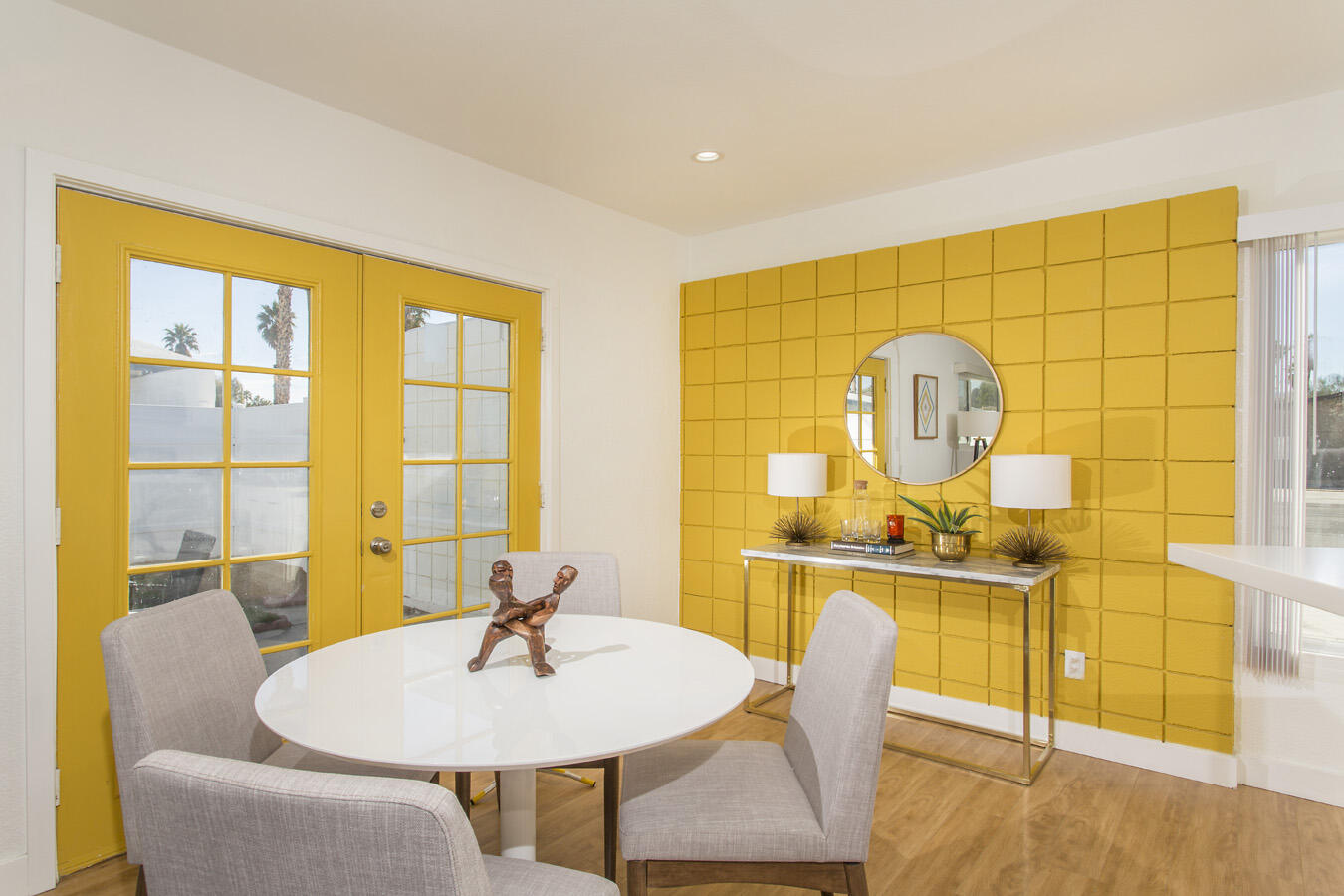 68080 Risueno Road Cathedral City, CA 92234 - Photo 9 of 98 a dining room with a table and chairs