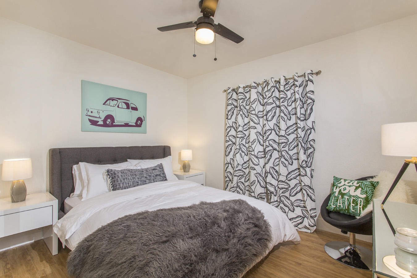 68080 Risueno Road Cathedral City, CA 92234 - Photo 92 of 98 a bedroom with a bed and a chandelier