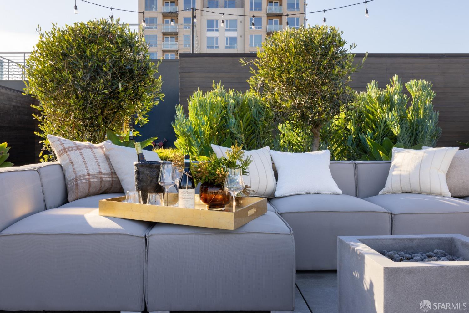 1201 Sutter Street, Unit PH603 San Francisco, CA 94109 - Photo 11 of 13 a outdoor living space with furniture and flowers