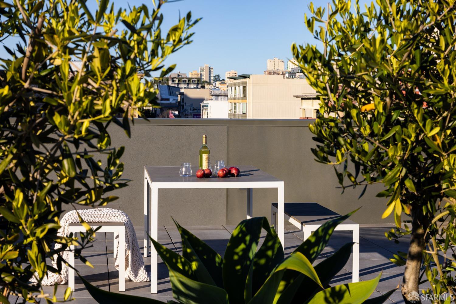 1201 Sutter Street, Unit PH603 San Francisco, CA 94109 - Photo 12 of 13 a view of balcony with plants and outdoor seating
