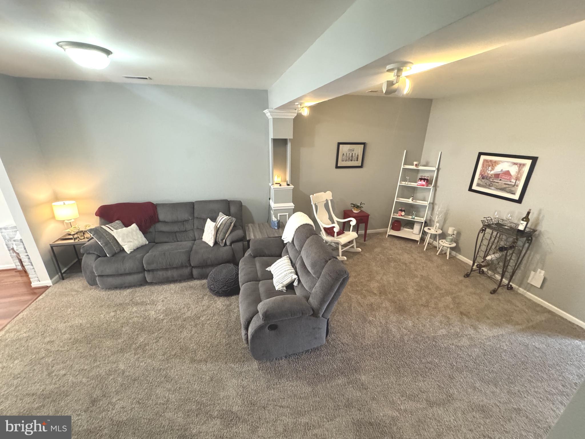 189 Gillespie Avenue Middletown, DE 19709 - Photo 11 of 62 a living room with furniture and a mirror