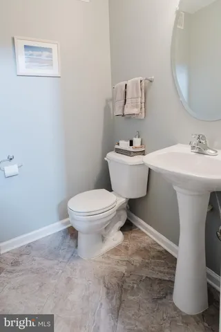 a kitchen with a stove and a sink