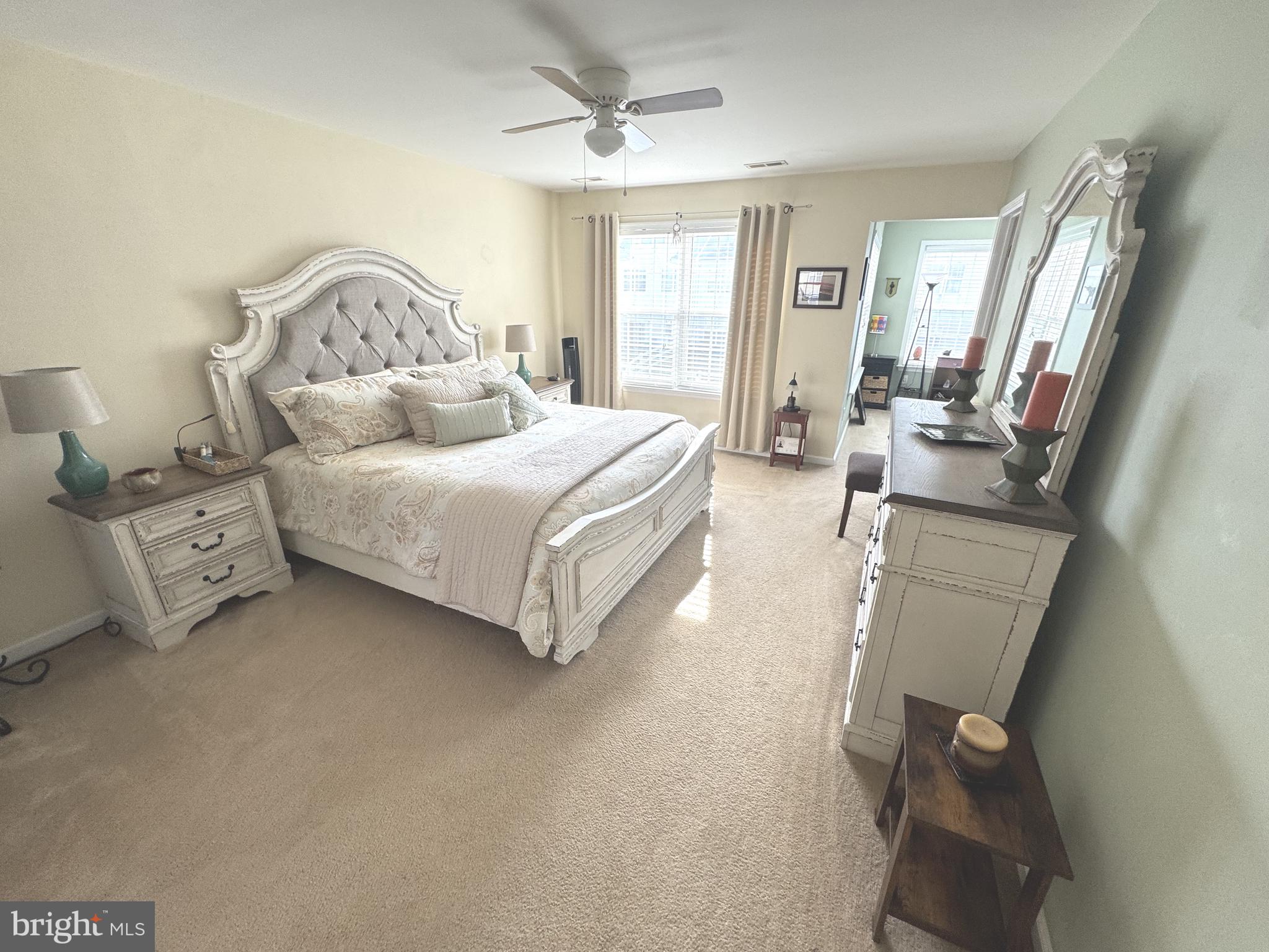 189 Gillespie Avenue Middletown, DE 19709 - Photo 39 of 62 a spacious bedroom with a bed and a dresser in it