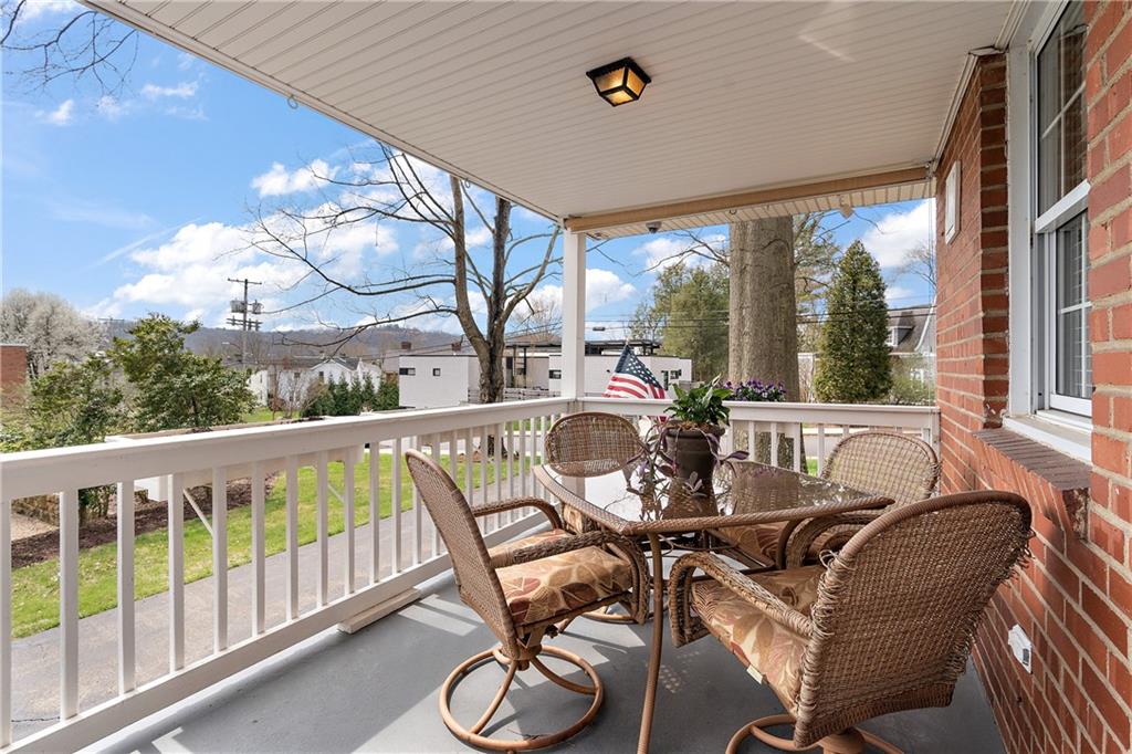 349 Backbone Road Sewickley, PA 15143 - Photo 14 of 25 a view of a balcony with furniture and garden view