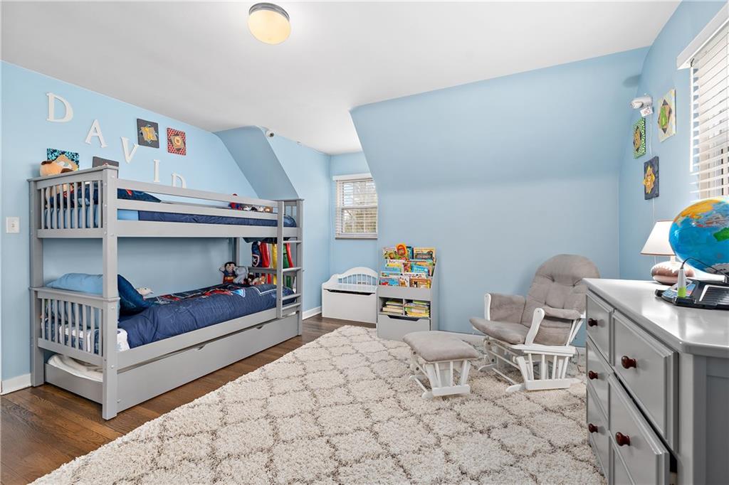 349 Backbone Road Sewickley, PA 15143 - Photo 19 of 25 a bed room with a bed and a chair