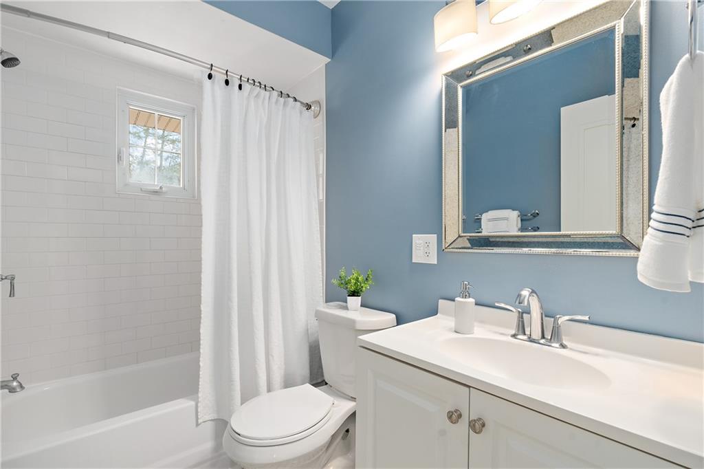 349 Backbone Road Sewickley, PA 15143 - Photo 23 of 25 a bathroom with a sink a toilet and shower