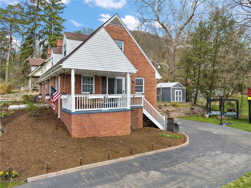 349 Backbone Road Sewickley, PA 15143 - Photo 3 of 25 a front view of a house with a yard