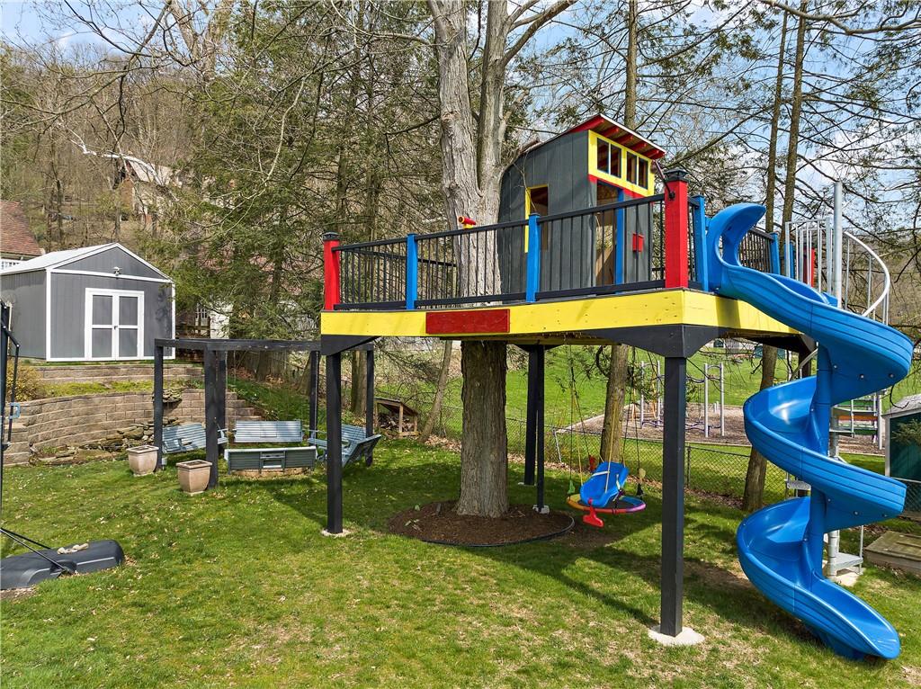 349 Backbone Road Sewickley, PA 15143 - Photo 6 of 25 a front view of house with outdoor seating and green space