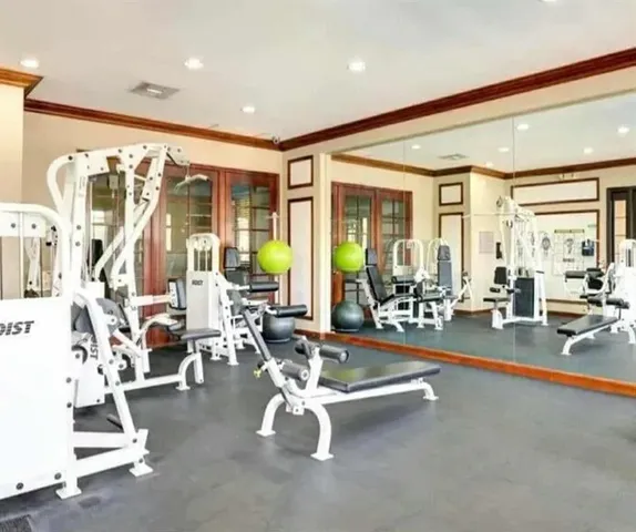 a view of a room with gym equipment