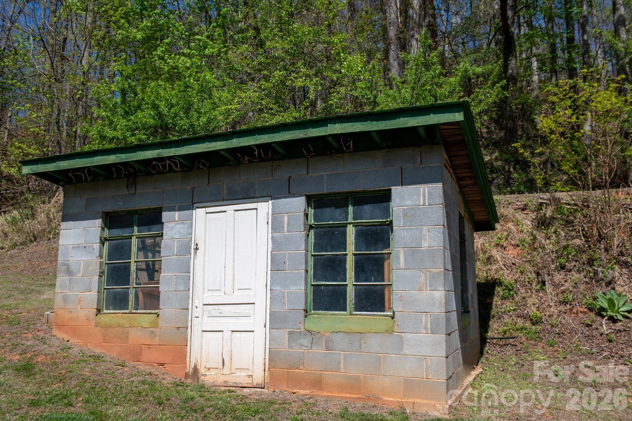 2687 Indian Grave Road Lenoir, NC 28645 - Photo 11 of 31 a front view of a house with a yard