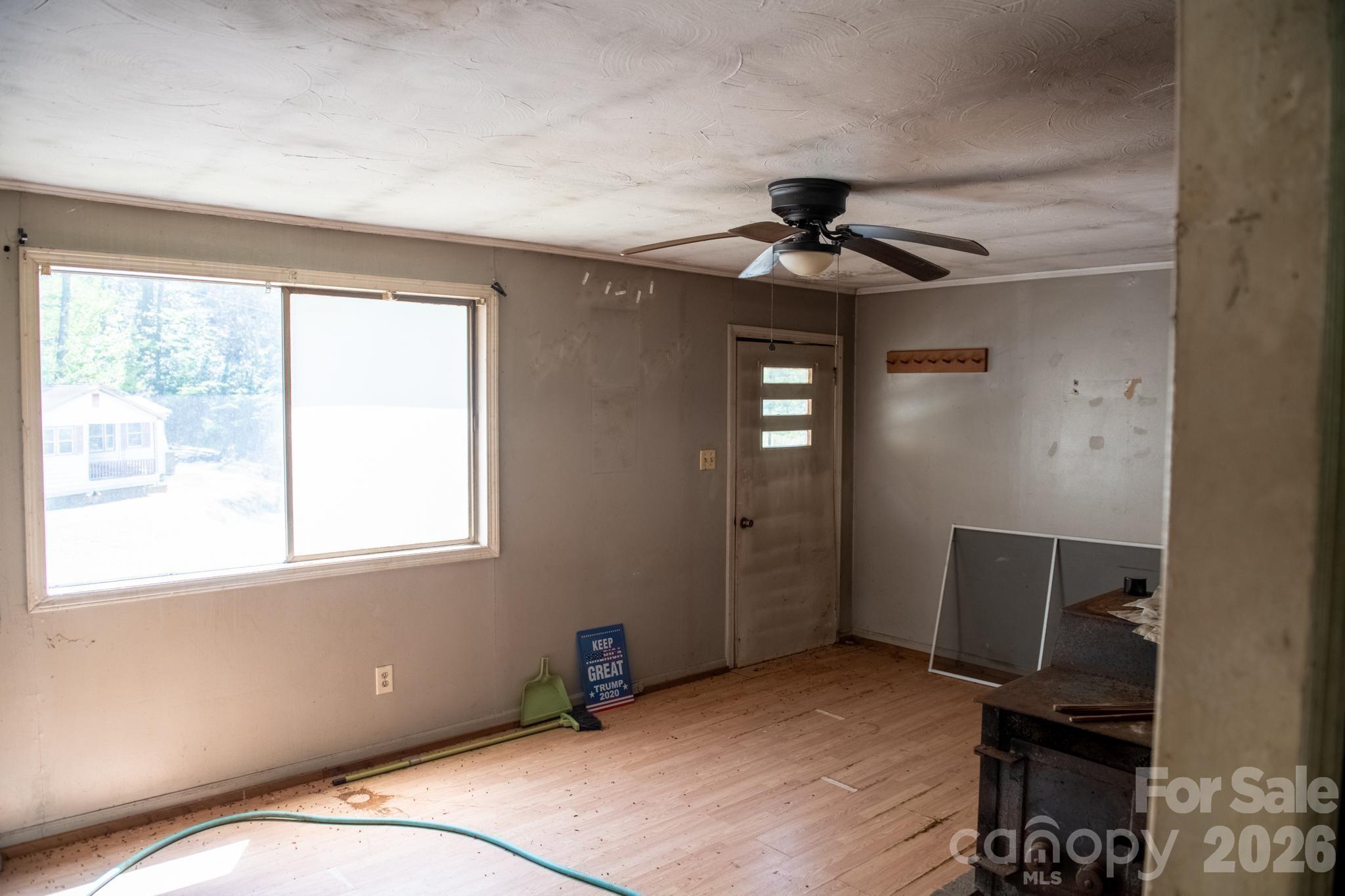 2687 Indian Grave Road Lenoir, NC 28645 - Photo 7 of 31 a bedroom with ceiling fan and window