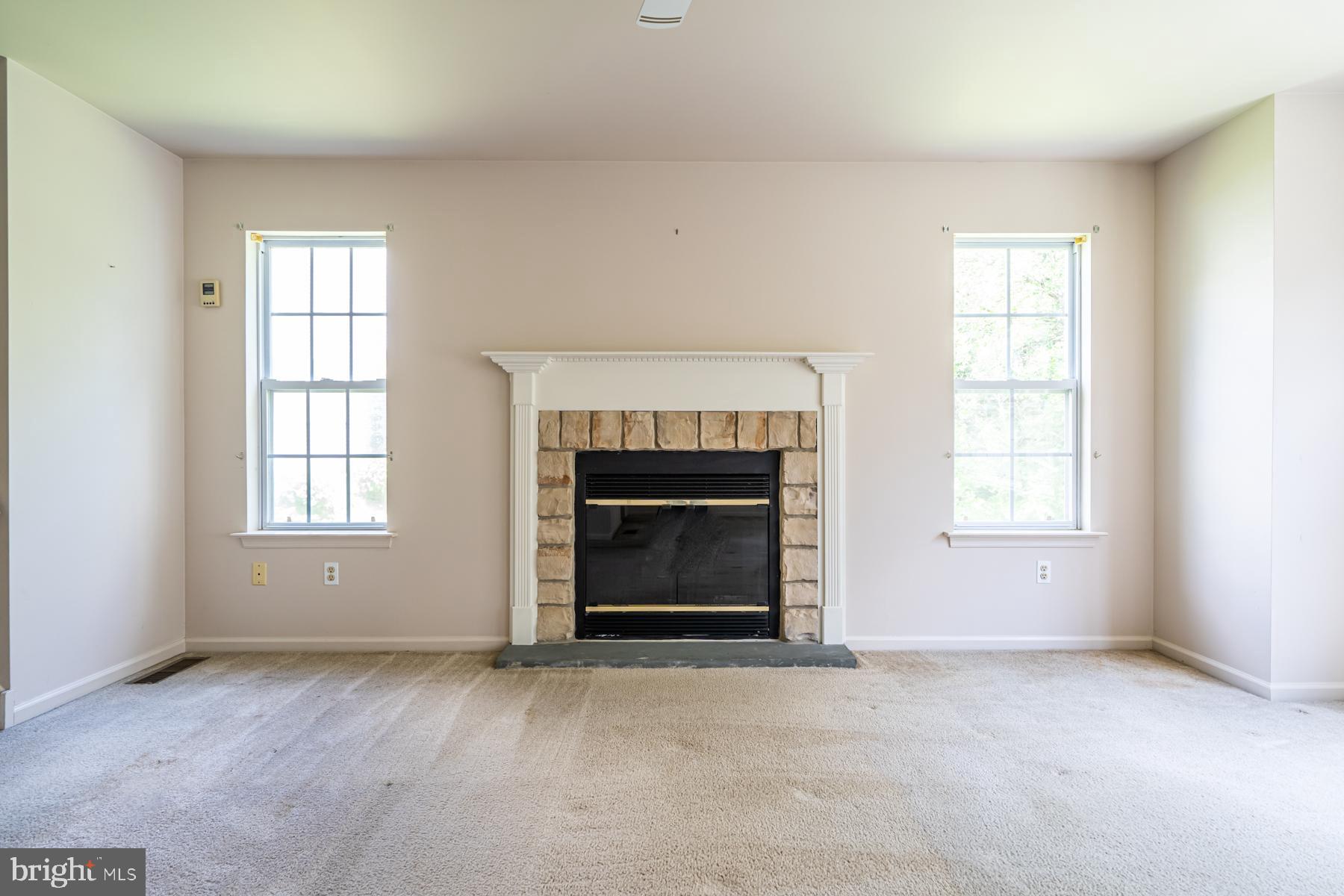 128 Deer Run Road Perkasie, PA 18944 - Photo 4 of 35 Living room FP is natural gas