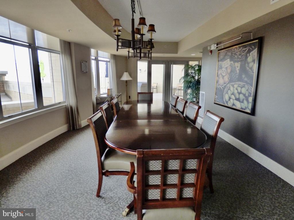 11800 Sunset Hills Road, Unit 118 Reston, VA 20190 - Photo 47 of 52 Elegant dining space with natural light.