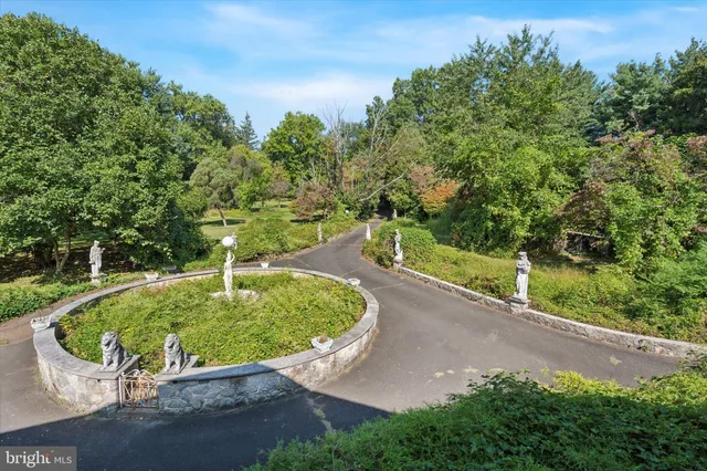 a view of a garden with a fountain