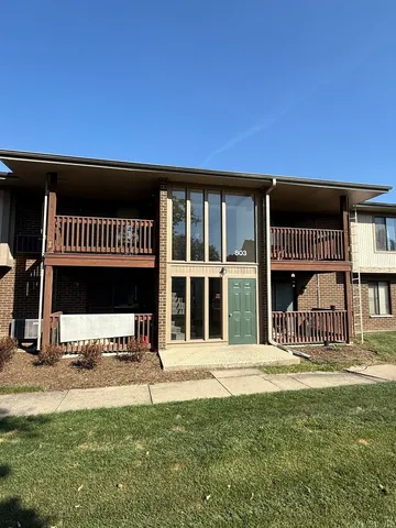 a view of a house with a balcony