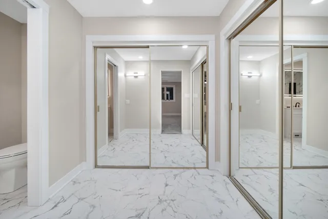 a view of a bathroom with shower