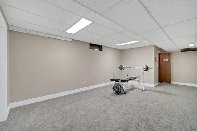 a view of room with gym equipment