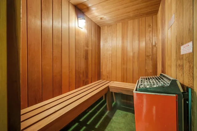 a view of room with window and furniture