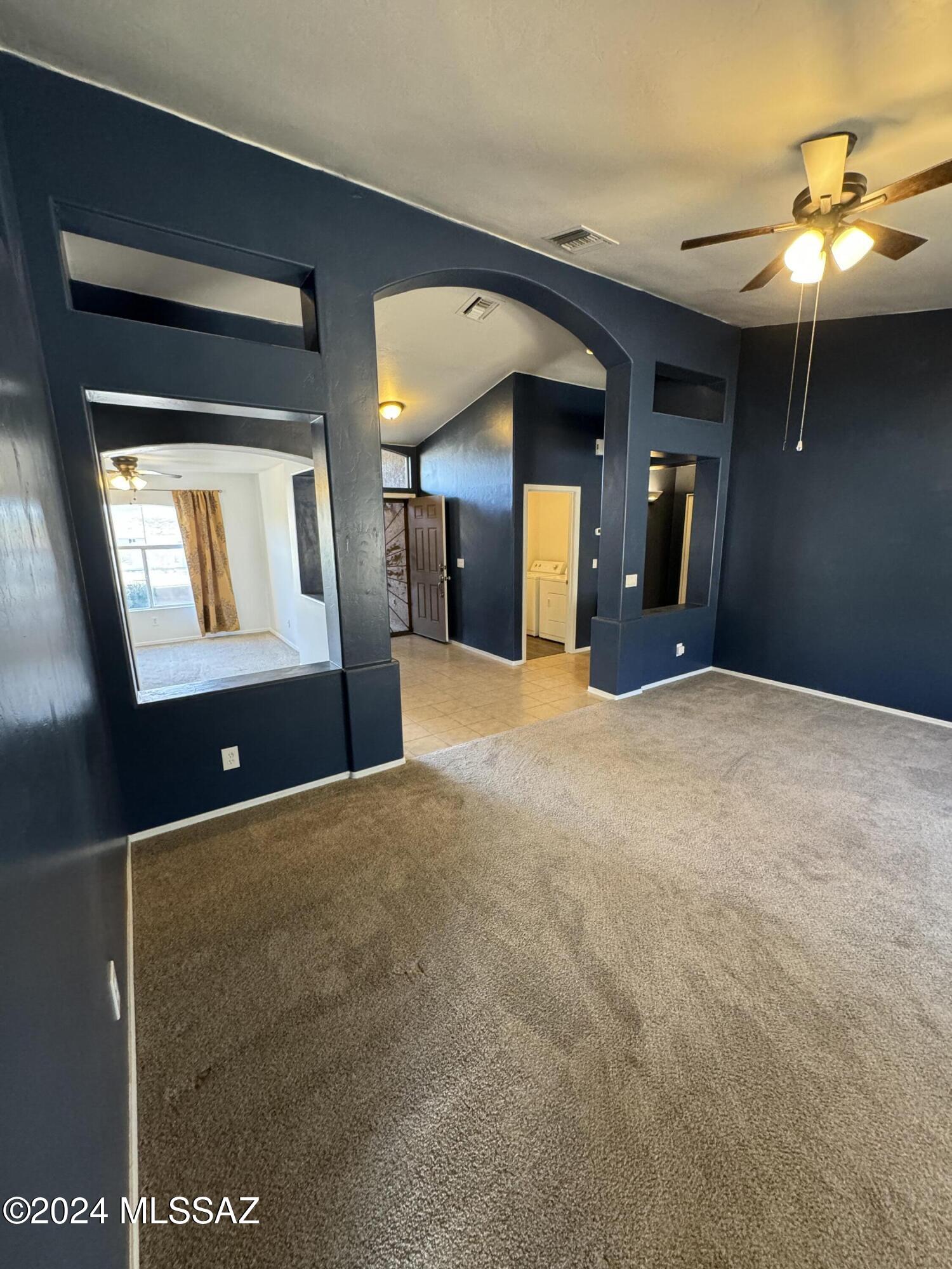 1841 America Court Rio Rico, AZ 85648 - Photo 6 of 38 a view of a livingroom with a fireplace