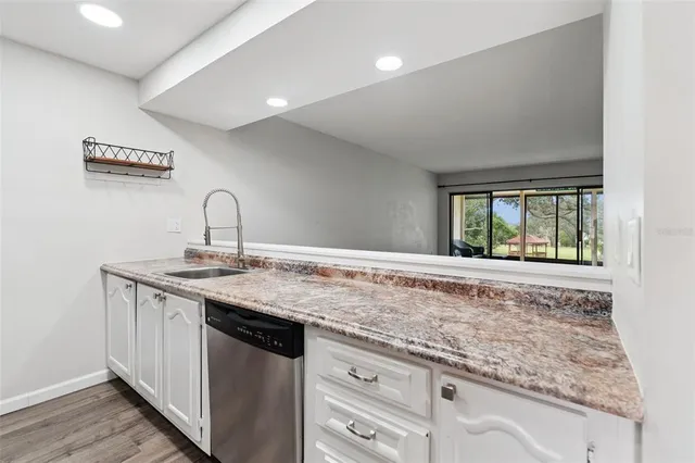 a kitchen with a stove and a microwave