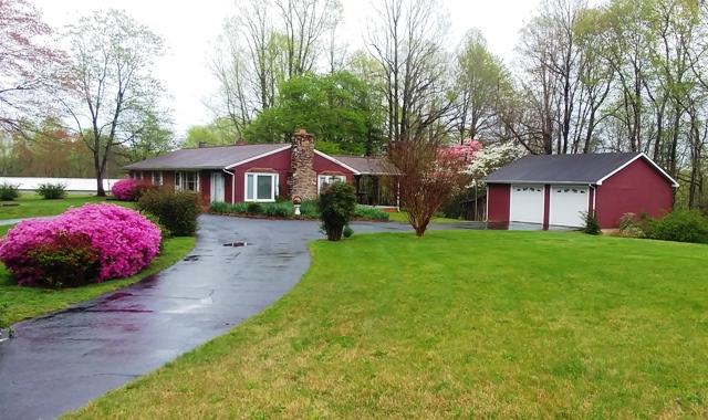124 Pony Ridge Road Bassett, VA 24055 - Photo 1 of 41 a front view of a house with garden
