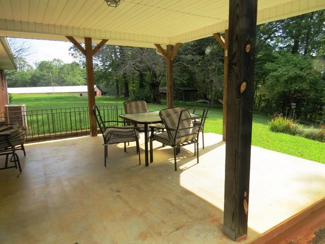 124 Pony Ridge Road Bassett, VA 24055 - Photo 18 of 41 a view of a patio with a big yard