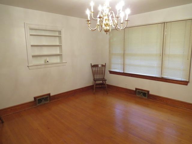 124 Pony Ridge Road Bassett, VA 24055 - Photo 19 of 41 wooden floor in an empty room with a window