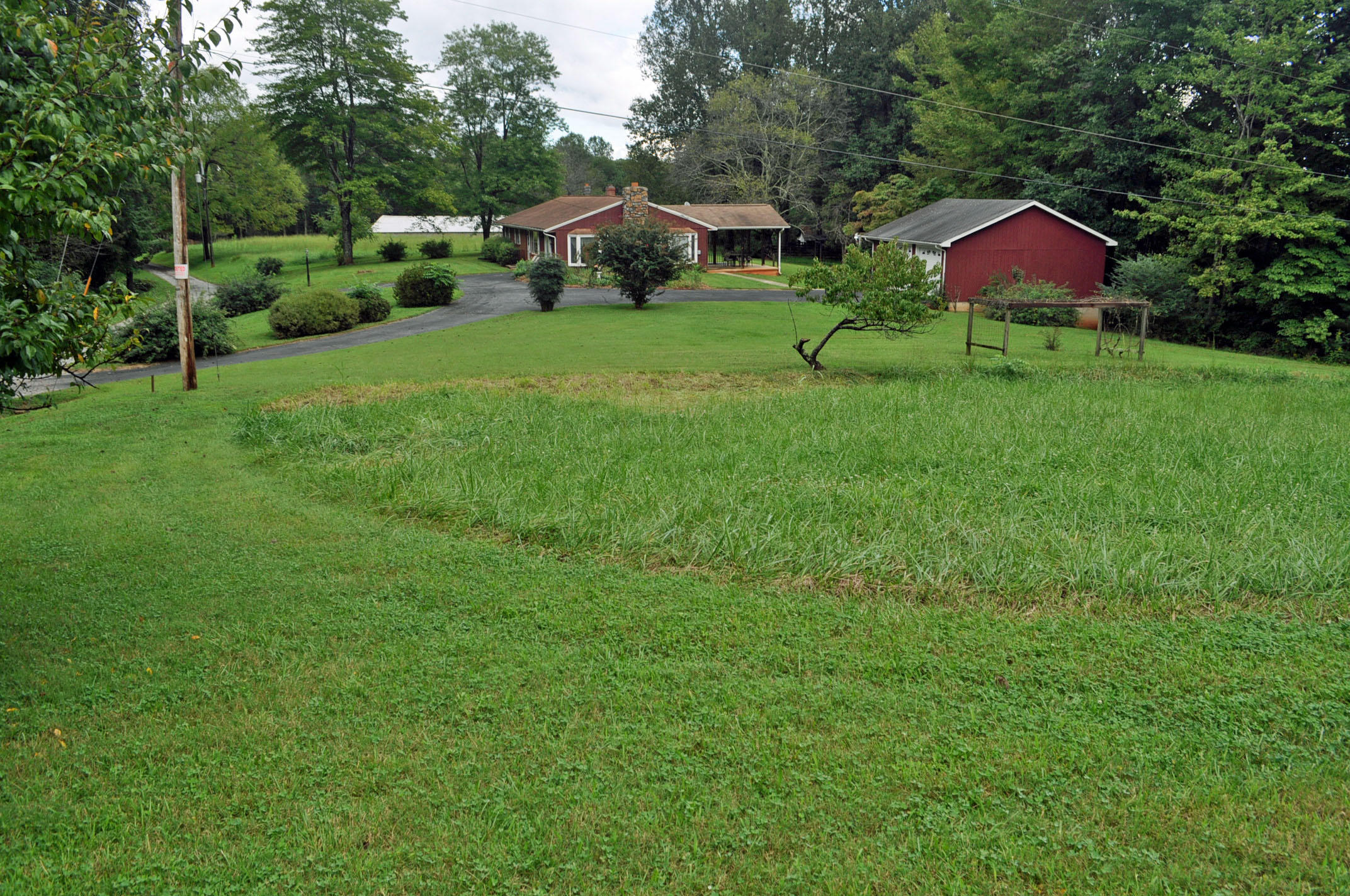 124 Pony Ridge Road Bassett, VA 24055 - Photo 3 of 41 a view of a house with a yard and sitting area