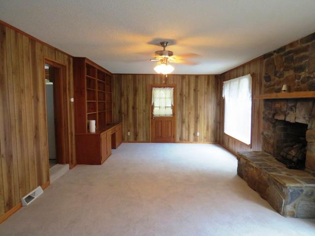 124 Pony Ridge Road Bassett, VA 24055 - Photo 25 of 41 a spacious bedroom with a bed and a ceiling fan