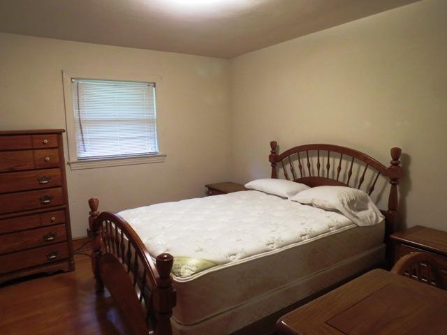 124 Pony Ridge Road Bassett, VA 24055 - Photo 29 of 41 a bed sitting in a bedroom next to a window
