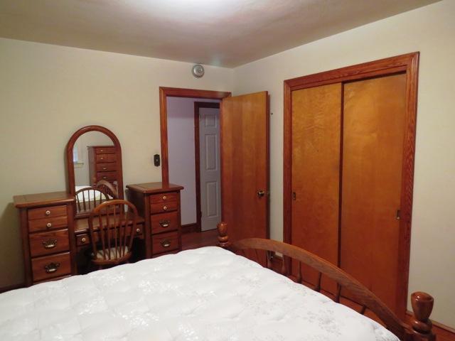124 Pony Ridge Road Bassett, VA 24055 - Photo 31 of 41 a bedroom with a bed and a dresser