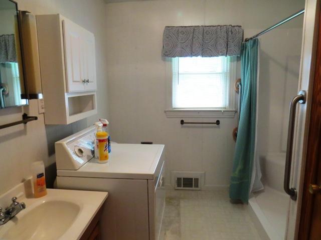 124 Pony Ridge Road Bassett, VA 24055 - Photo 32 of 41 a bathroom with a sink and a mirror