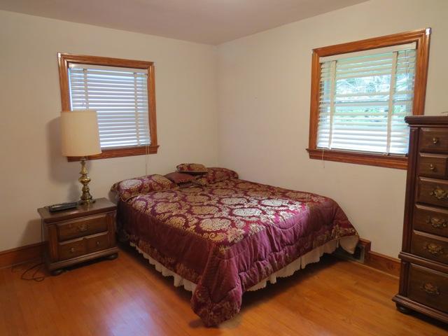 124 Pony Ridge Road Bassett, VA 24055 - Photo 33 of 41 a bedroom with a bed and a window