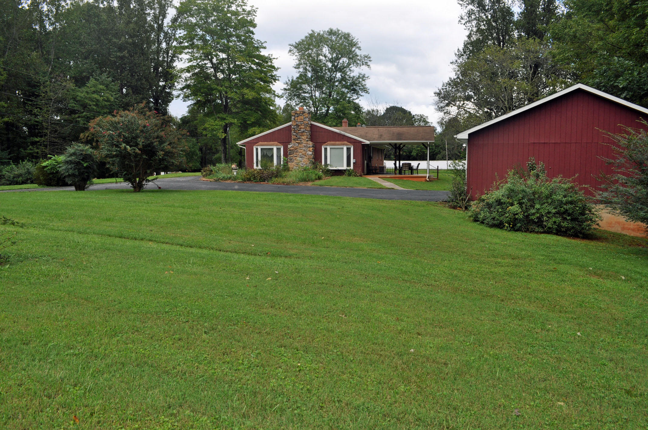 124 Pony Ridge Road Bassett, VA 24055 - Photo 7 of 41 a front view of house with yard and green space