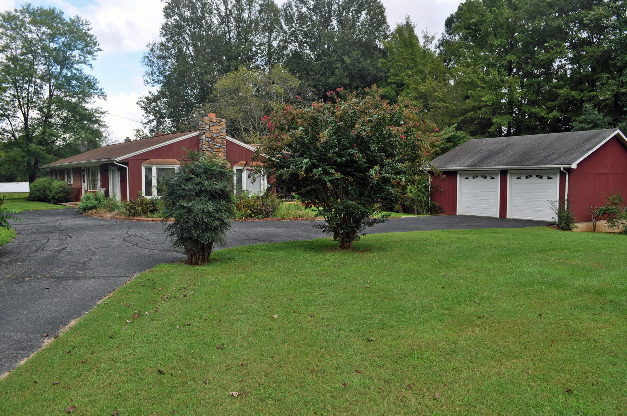 124 Pony Ridge Road Bassett, VA 24055 - Photo 8 of 41 a front view of house with yard and green space