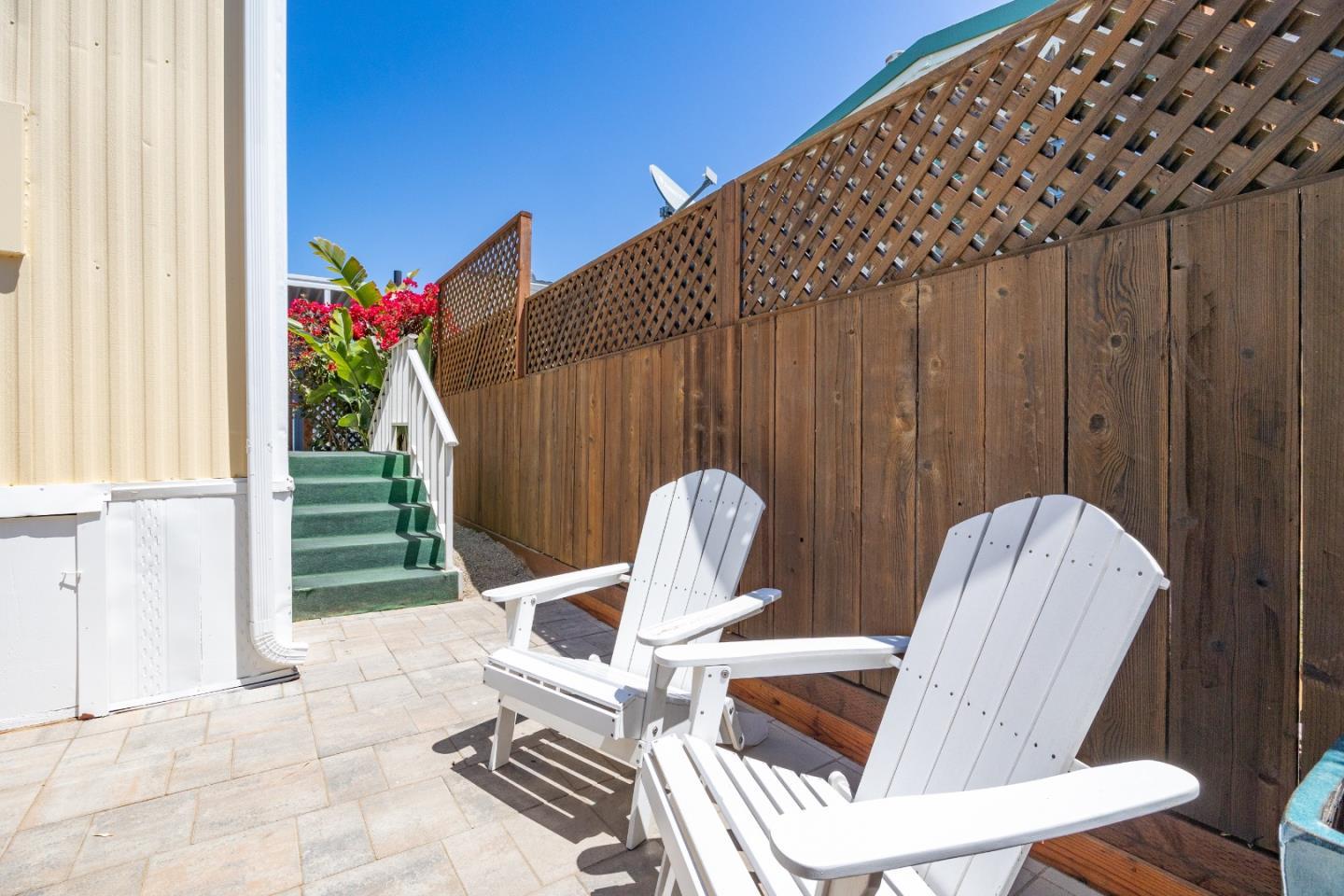 4160 Jade Street, Unit 69 Capitola, CA 95010 - Photo 22 of 27 a view of a chairs in patio of the house