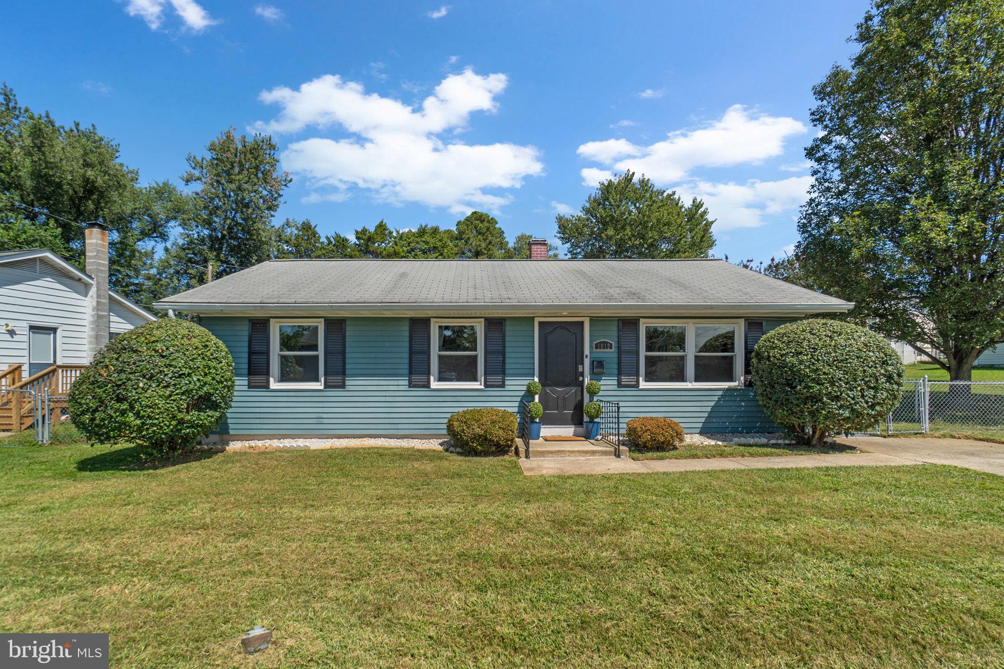 1012 Dunholme Road Reisterstown, MD 21136 - Photo 1 of 30 a view of a house with backyard sitting area and garden