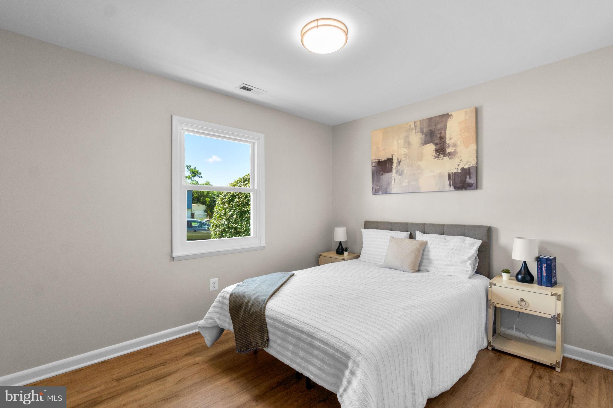 1012 Dunholme Road Reisterstown, MD 21136 - Photo 14 of 30 a bedroom with a bed and a window