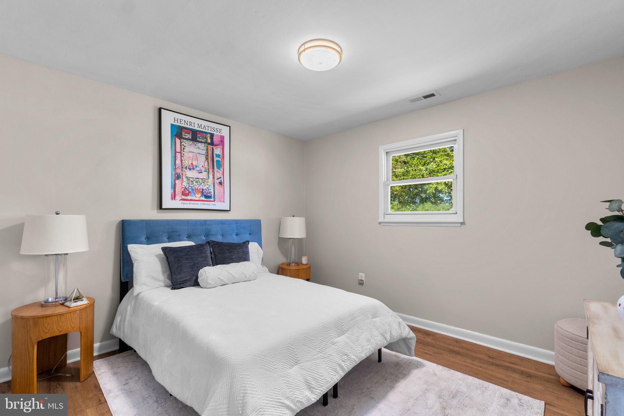 1012 Dunholme Road Reisterstown, MD 21136 - Photo 17 of 30 a bedroom with a bed and a painting on the wall